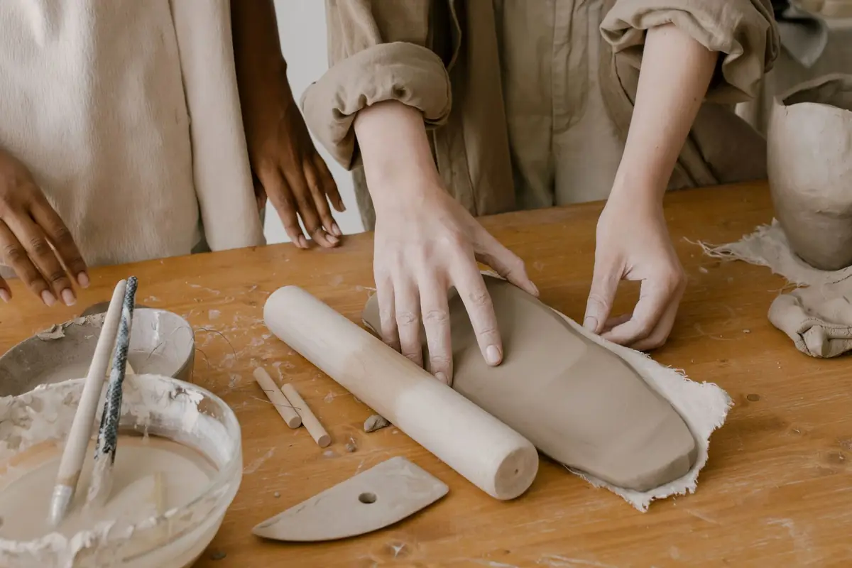 People making together at a studio table